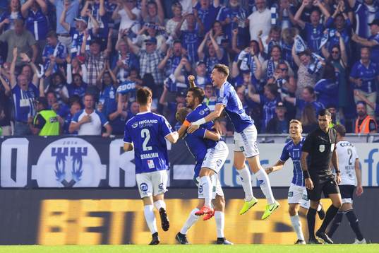 Joachim Thomassen of Sarpsborg 08 celebrate with teammates