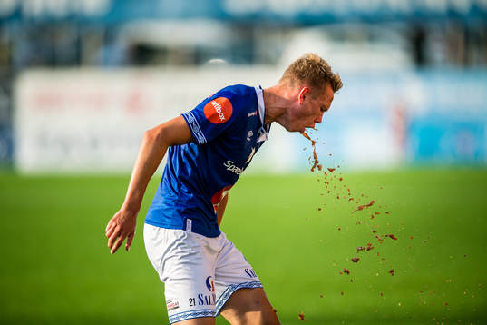 Torbjørn Lysaker Heggem of Ranheim throws up