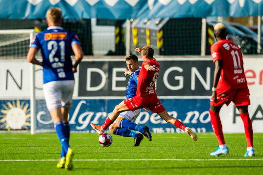 Mads Reginiussen of Ranheim and Petter Dahle Strand of Brann