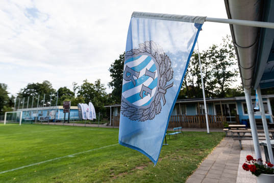 Flagga med Råå IFs klubbmärke på