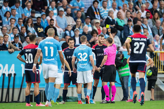Irfan Hadzic of Zrinjski is shown a yellow card