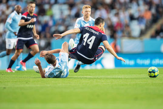 Markus Rosenberg of Malmö FF and Edin Rustemovic of