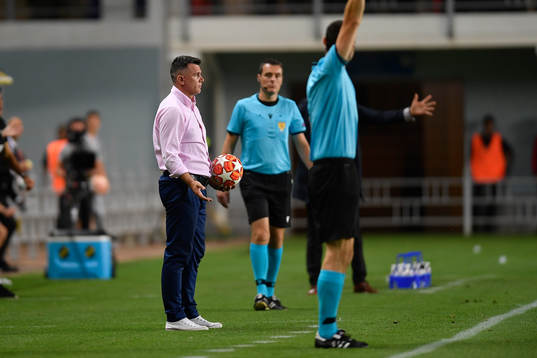 Sheriff's head coach Zoran Zekic steals the ball in front