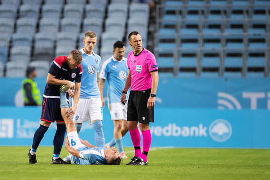 Advan Kadusic of Zrinjski helps Markus Rosenberg of Malmö