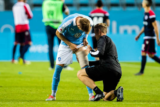 Rasmus Bengtsson of Malmö FF gets his leg checked