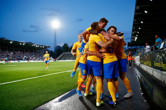 Players of IFK Norrköping celebrate with Maic Sema