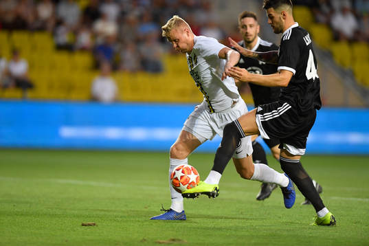 Kolbeinn Sigthorsson of AIK in action against Lukic of
