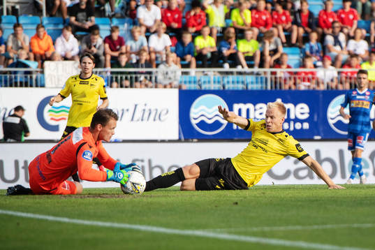 goalkeeper Jacob Storevik of Sandefjord and Martin Ramsland