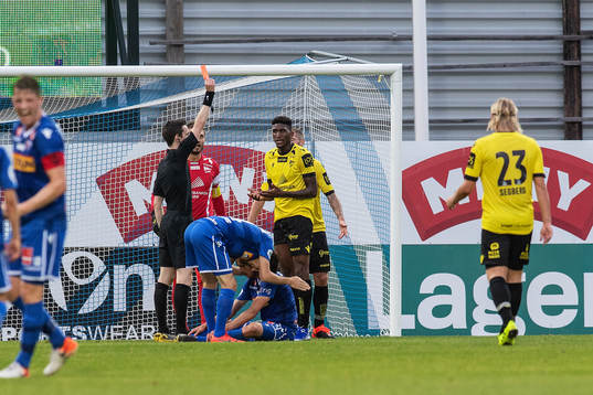 Damion Lowe of Start is shown a red card