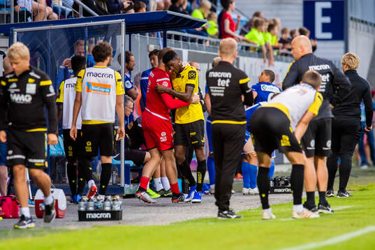 Damion Lowe of Start walks of the picth with a red card