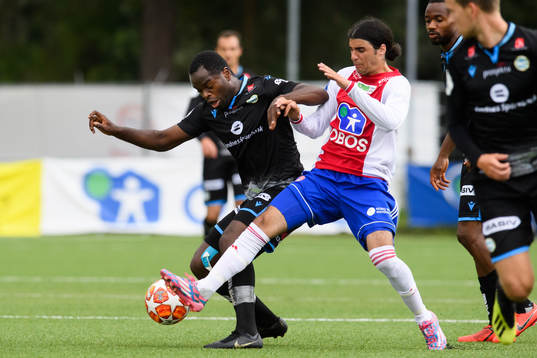 Christian Landu-Landu of Sandnes Ulf and Yannis Maxitas