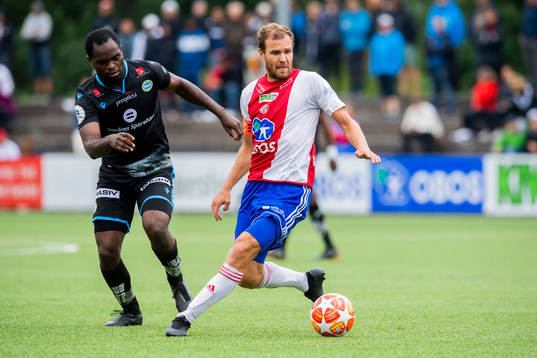 Christian Landu-Landu of Sandnes Ulf and Stian Sortevik of
