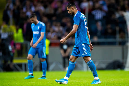 Emre Can of Juventus looks dejected