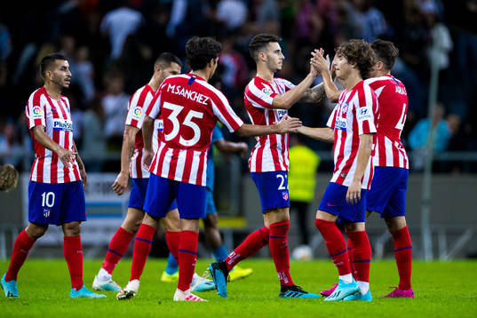 Players of Atletico Madrid celebrates