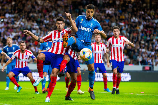 Alvaro Morata of Atletico Madrid and Sami Khedira of
