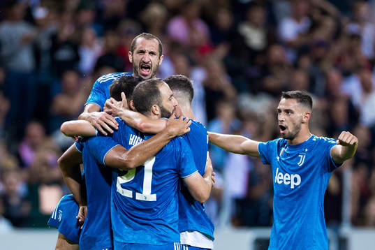 Sami Khedira of Juventus celebrates with Giorgio Chiellini