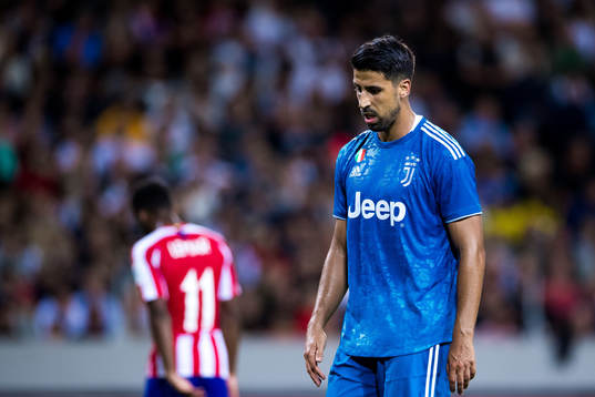 Sami Khedira of Juventus looks dejected