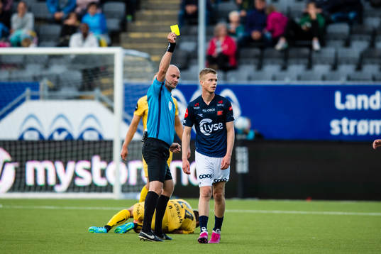 Samuel Kari Fridjonsson of Viking gets a yellow card