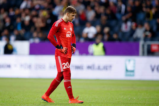 Goalkeeper Zvonimir Mikulic looks dejected