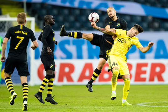 Panajotis Dimitriadis of AIK battles for the ball with