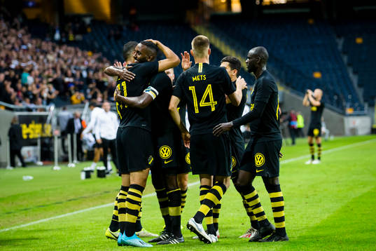 Henok Goitom of AIK hugs Nabil Bahoui