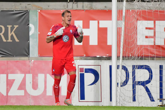 Goalkeeper Johan Dahlin of Malmö FF reacts