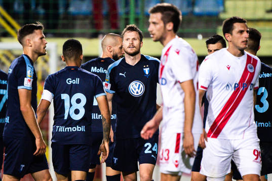 Lasse Nielsen of Malmö FF celebrate with teammates