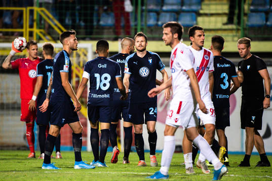Lasse Nielsen of Malmö FF celebrate with teammates
