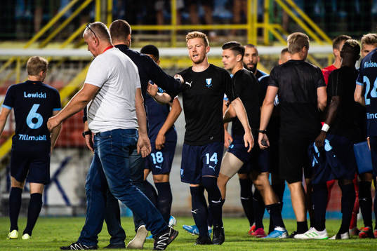 Anders Christiansen of Malmö FF celebrate with teammates