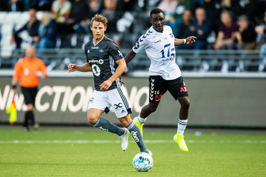 Vegar Eggen Hedenstad of Rosenborg and Joshua Gaston