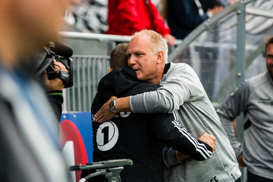Dag-Eilev Fagermo, head coach of Odd,  hugs Eirik