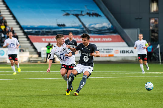 Markus André Kaasa of Odd and Anders Trondsen of Rosenborg