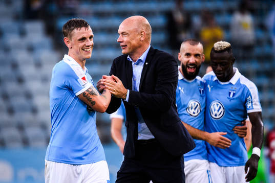 Malmö FFs Sören Rieks och tränare Uwe Rösler  jublar