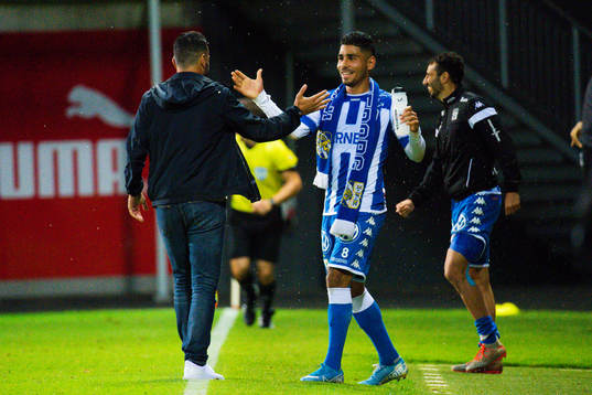 IFK Göteborgs tränare Poya Asbaghi och Hosam Aiesh jublar