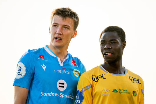 Axel Kryger of Sandnes Ulf and Eric Kitolano of Ull/Kisa