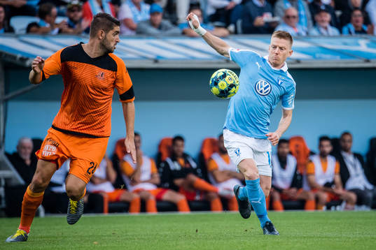 Matan Baltaxa of Bnei Yehuda and Anders Christiansen of