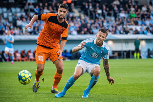 Alban Pnishi of Bnei Yehuda and Arnor Traustason of Malmö