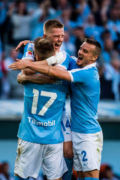Anders Christiansen and Eric Larsson hugs Rasmus Bengtsson