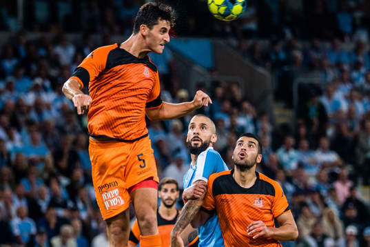 Daniel Felczer and Tambi Sagas of Bnei Yehuda and Guillermo