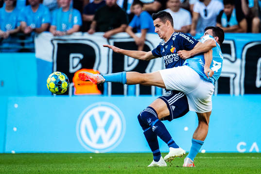 Djurgårdens Haris Radetinac och Malmö FFs Behrang Safari