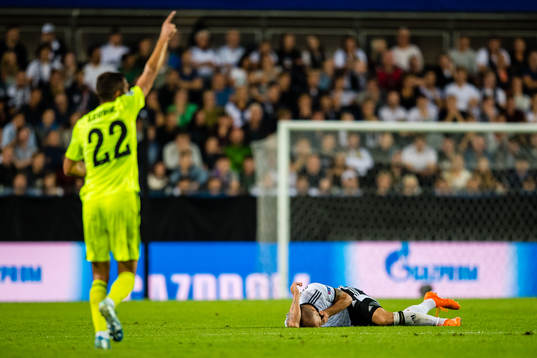 Tore Reginiussen of Rosenborg in pain