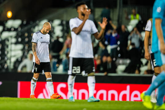 Tore Reginiussen of Rosenborg looks dejected