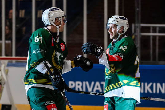 Johan Ryno and Per Åslund of Färjestad celebrate