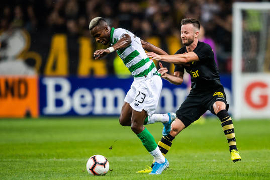 Boli Bolingoli of Celtic and Robert Lundström of AIK