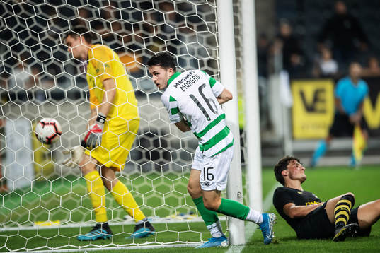Lewis Morgan of Celtic scores 1-4 behind goalkeeper Oscar