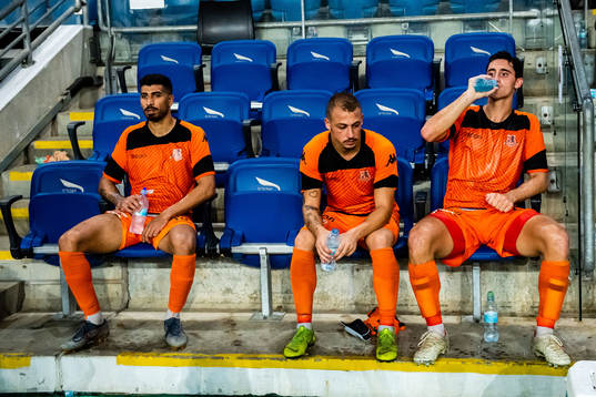 Players of Bnei Yehuda looks dejected