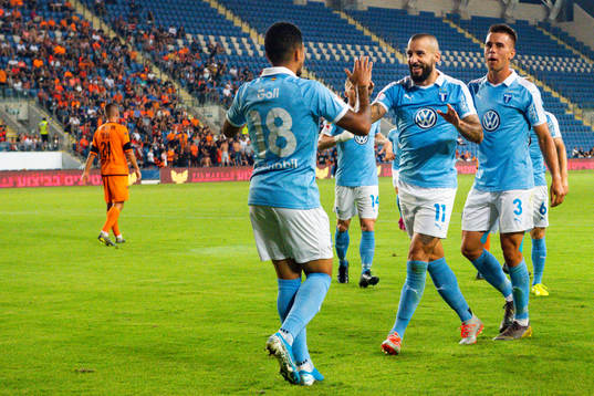 Guillermo Molins celebrates with Romain Gall and Jonas
