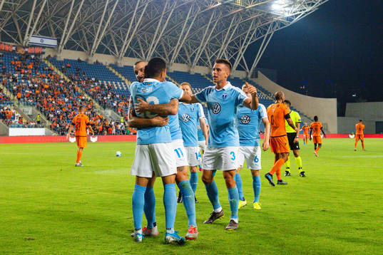 Guillermo Molins celebrates with Romain Gall and Jonas