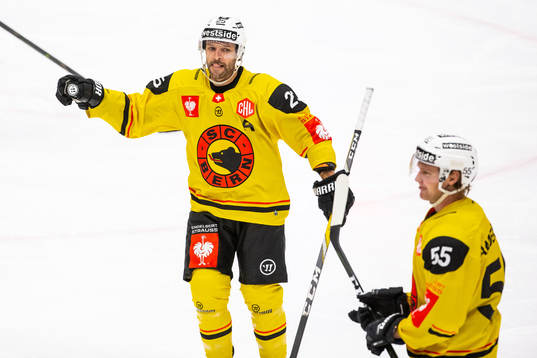 Andrew Ebbett of Bern celebrates