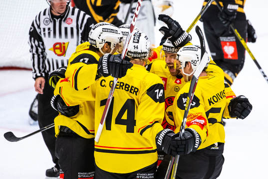 Alain Berger of Bern celebrate with teammates
